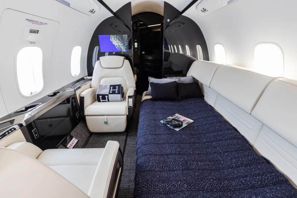 Challenger 350 charter private jet cabin interior photo 1 of 3