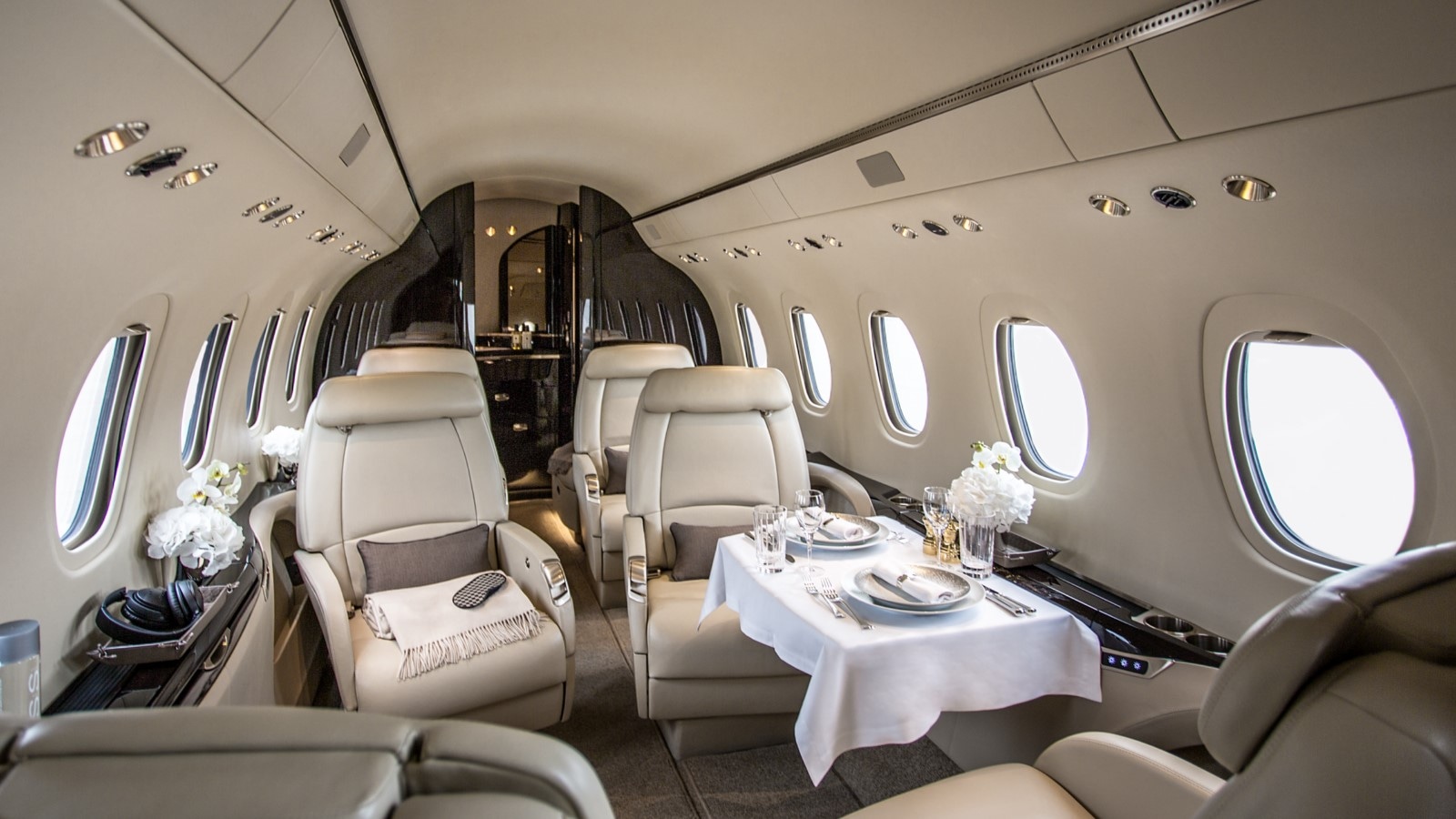 Citation Latitude charter private jet cabin interior photo 1 of 2