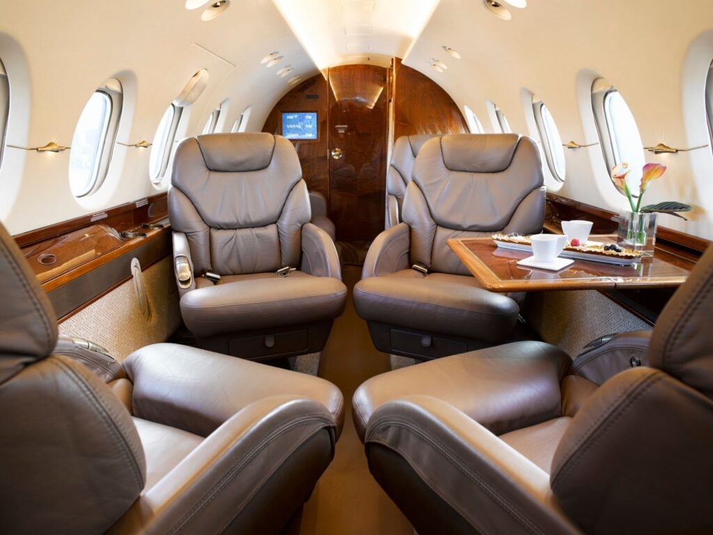 Hawker 800XP charter private jet cabin interior thumbnail 2