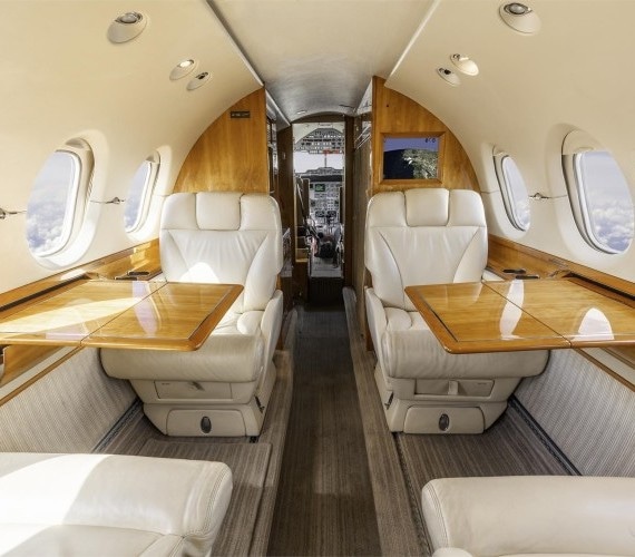 Hawker 800XP charter private jet cabin interior thumbnail 4