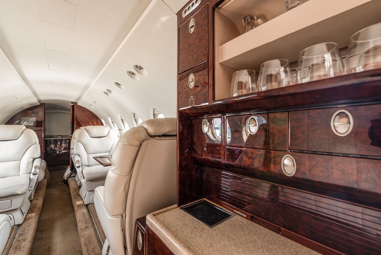 Hawker 800XP charter private jet cabin interior thumbnail 5