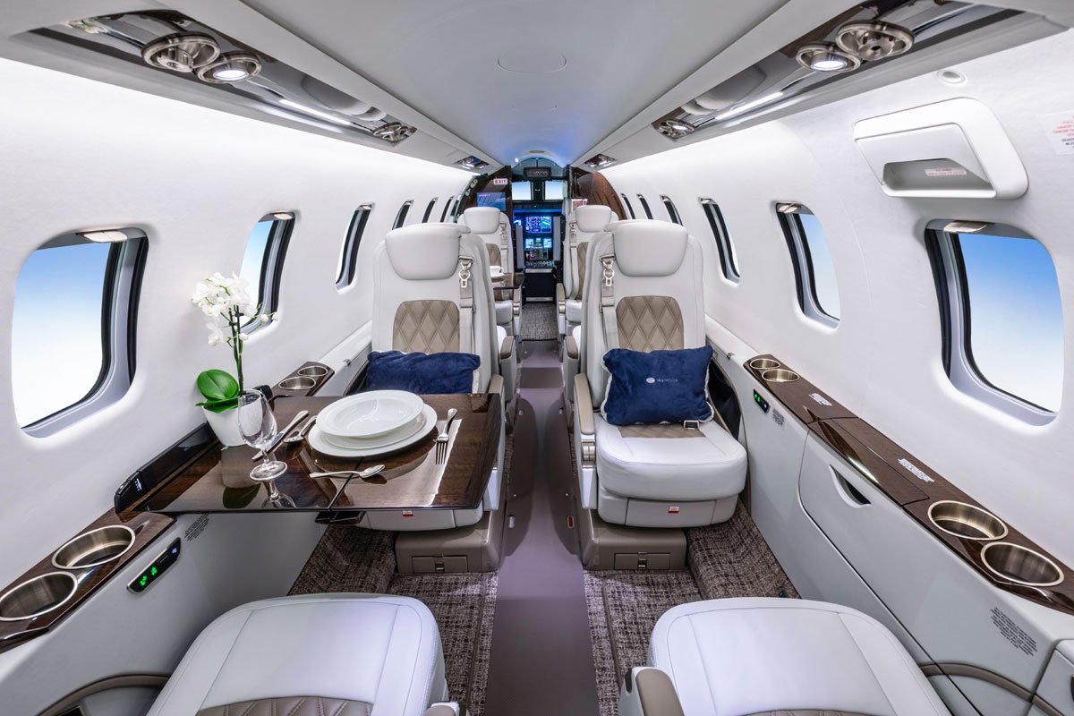 Learjet 75 charter private jet cabin interior photo 1 of 4