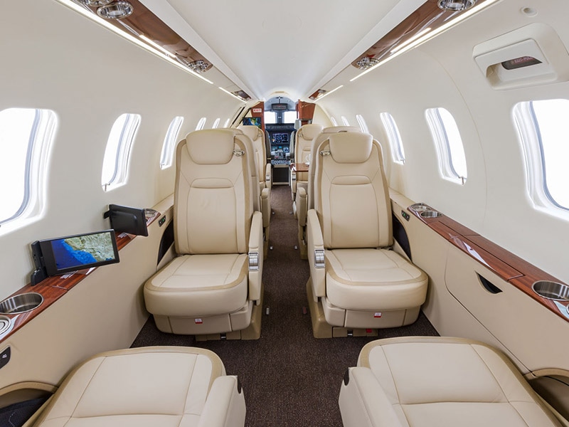 Learjet 75 charter private jet cabin interior thumbnail 3