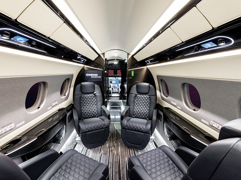 Praetor 600 charter private jet cabin interior photo 1 of 4