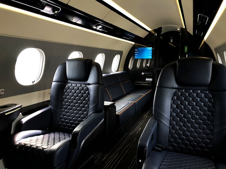 Praetor 600 charter private jet cabin interior thumbnail 2