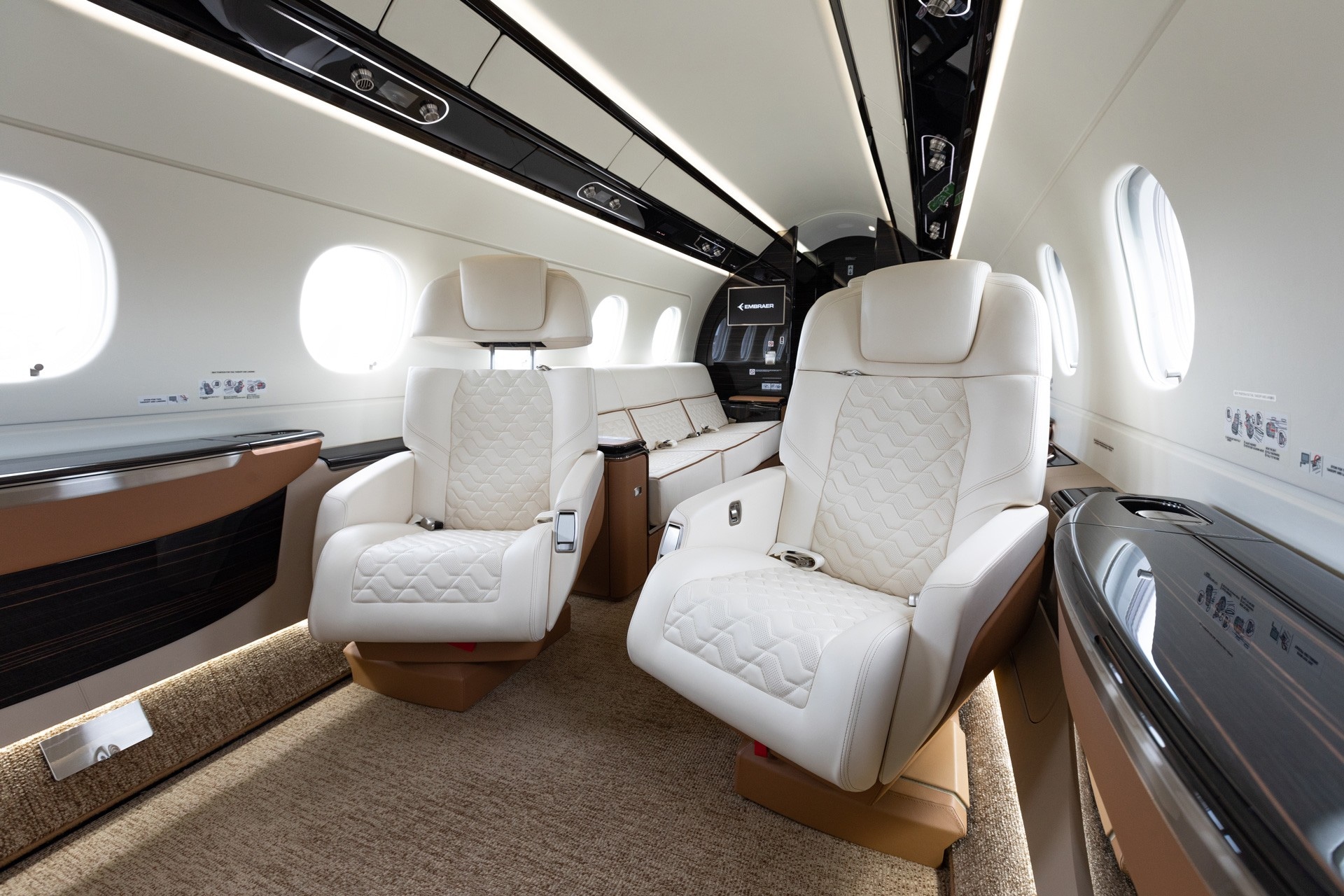 Praetor 600 charter private jet cabin interior thumbnail 3