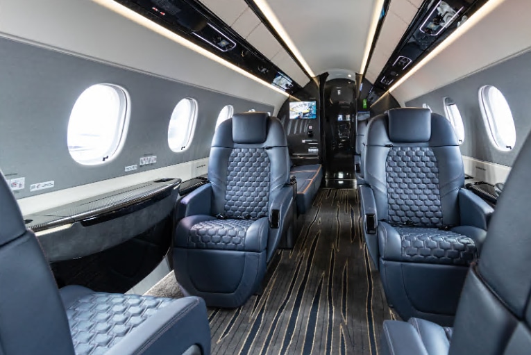 Praetor 600 charter private jet cabin interior thumbnail 4